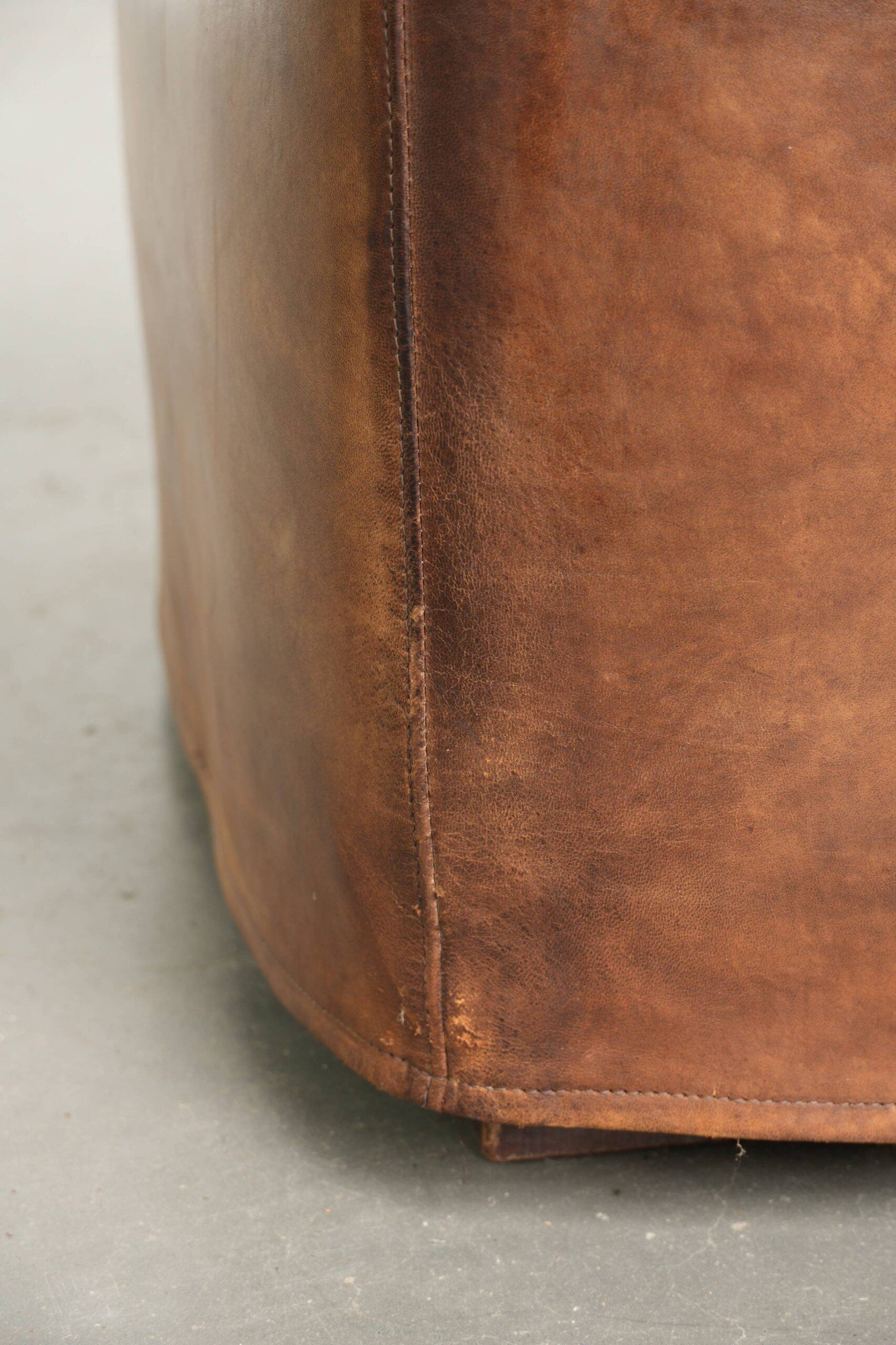 Sheepskin design ottoman with a very beautiful patina and stunning colours