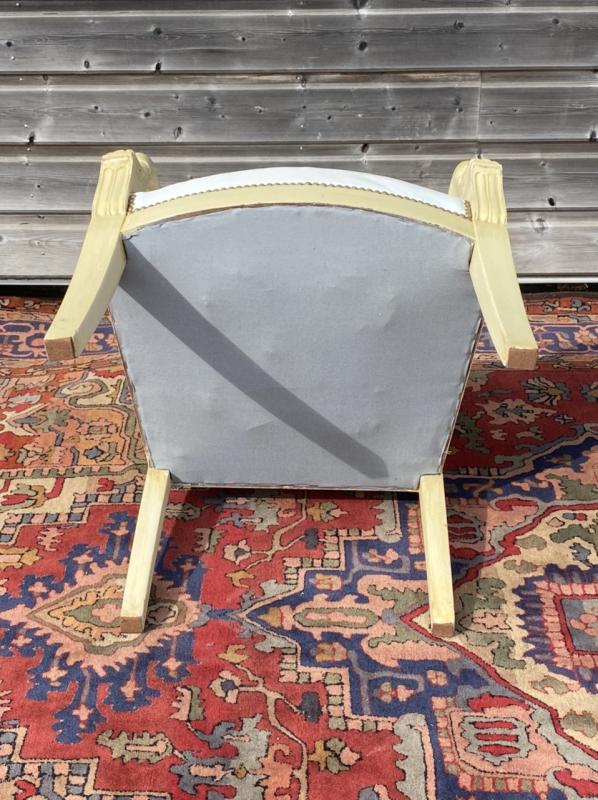 Paire de fauteuils aux dauphins d’époque empire en bois laqué
