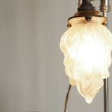 Old lamp rises and falls flame
