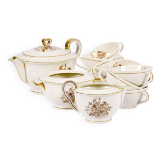 Porcelain tea service by Théodore Haviland, gilded patterns.