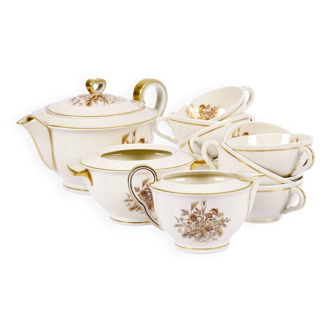 Service de thé en porcelaine de Théodore Haviland, motifs dorés.