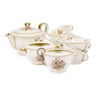 Service de thé en porcelaine de Théodore Haviland, motifs dorés.