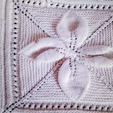 Knitted white cotton bedspread
