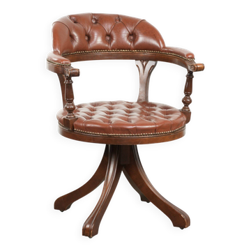 Swivel cowhide English style chesterfield office chair in a brown colour