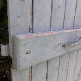 Pair of large wooden iron hanging shutters