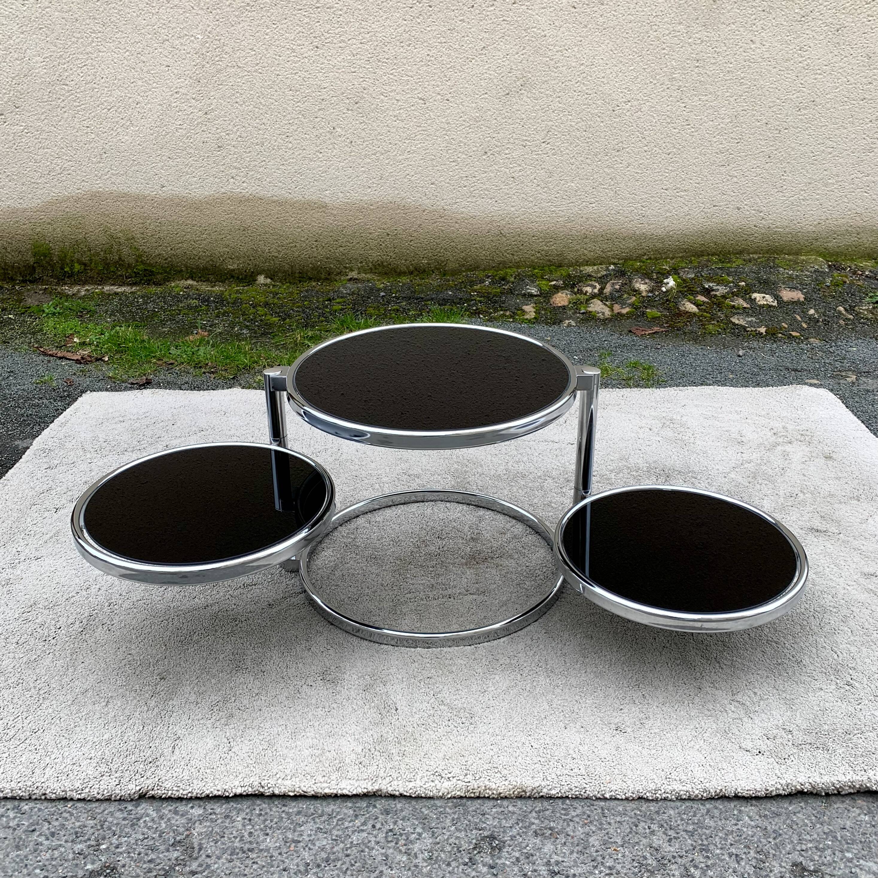 Articulated coffee table with 3 shelves, black glass and chrome, 1980