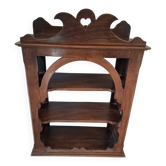Vintage wall shelf in carved wood