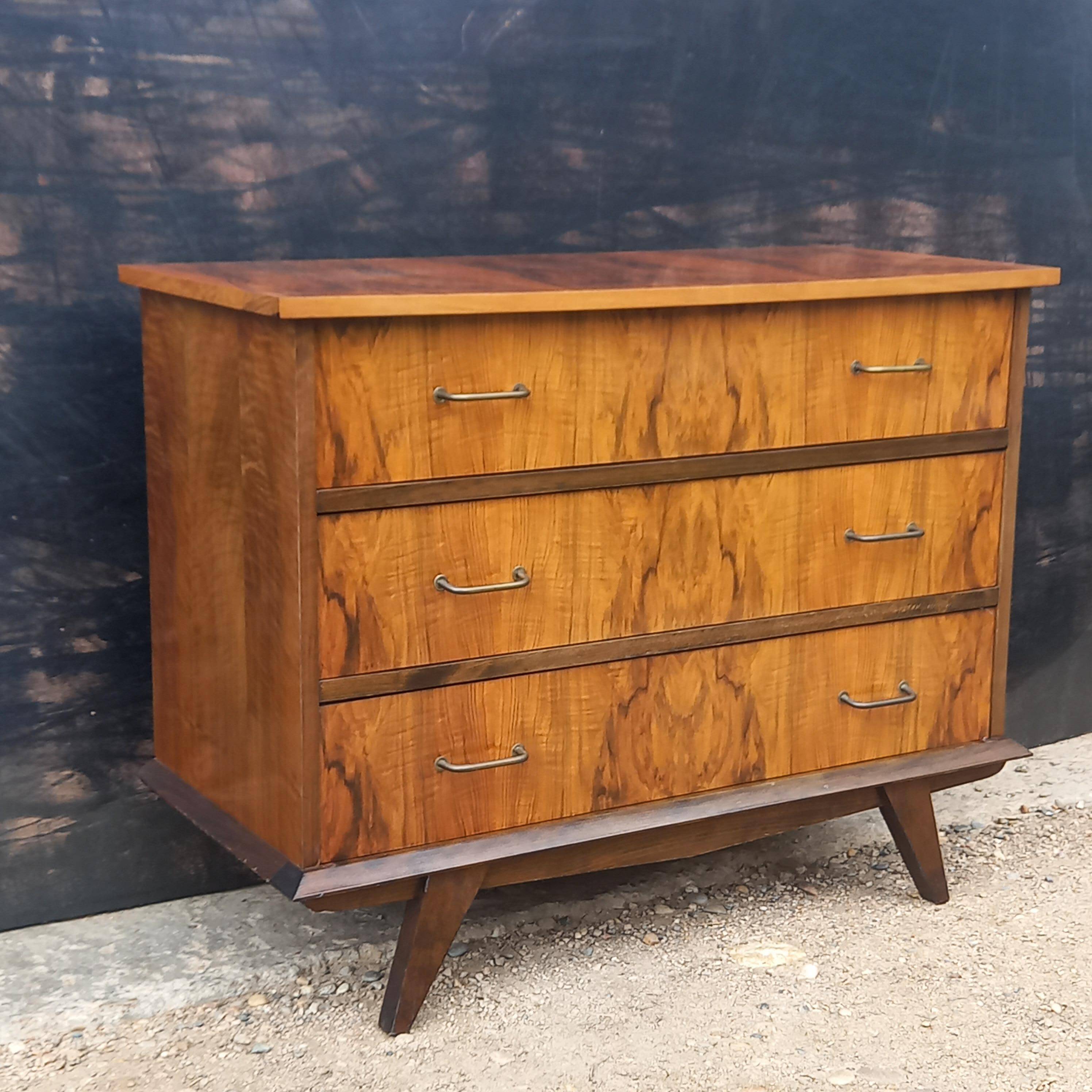 Rosewood chest of drawers with compass feet