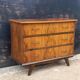 Rosewood chest of drawers with compass feet