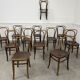 Suite de 12 chaises de bistrot à gaufrage végétal 1920
