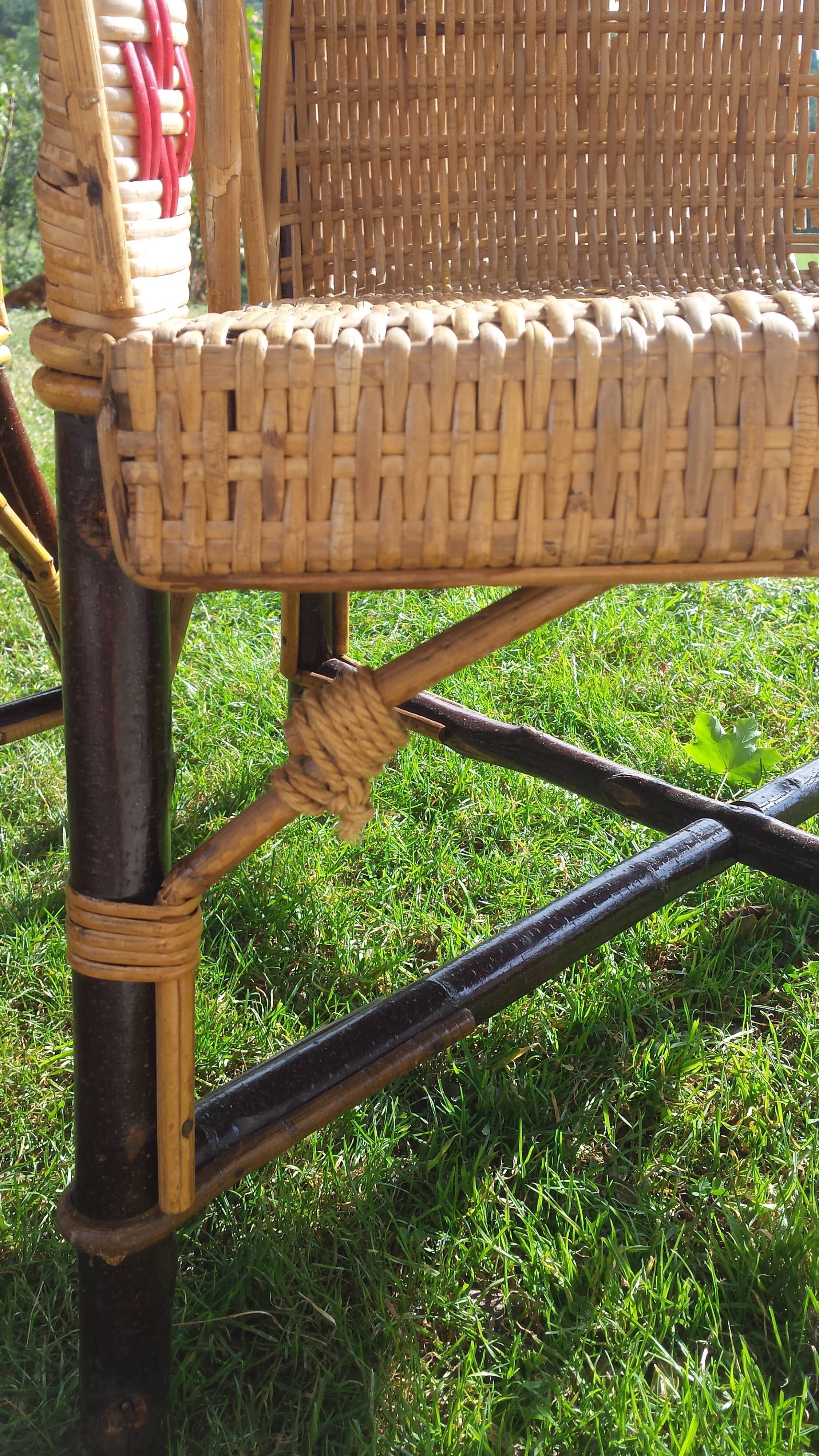 Wicker or rattan armchairs and bamboo