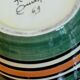 Vase boule Henriot Quimper arabesques vert orange