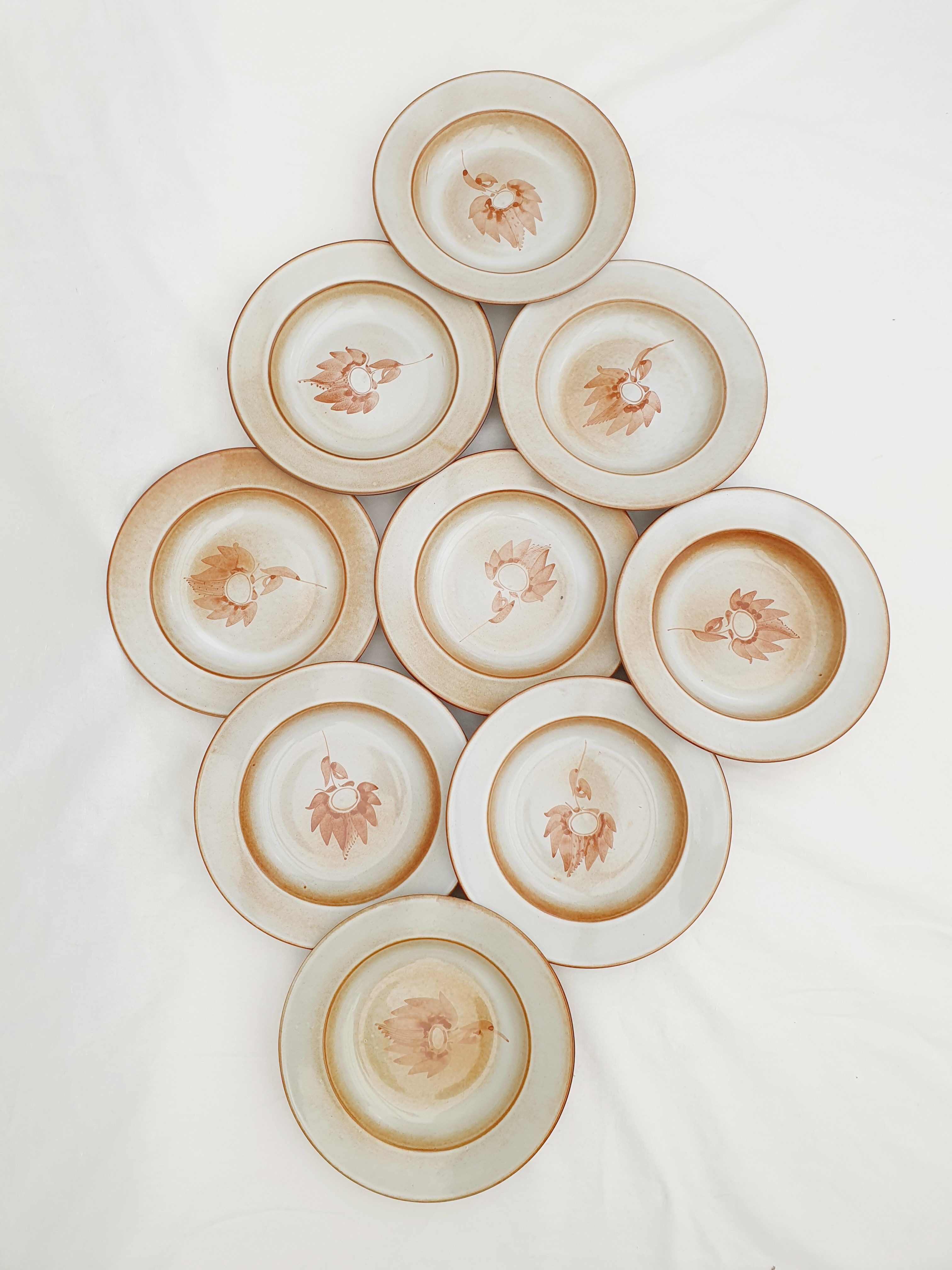 Series of 9 hollow plates pond sandstone