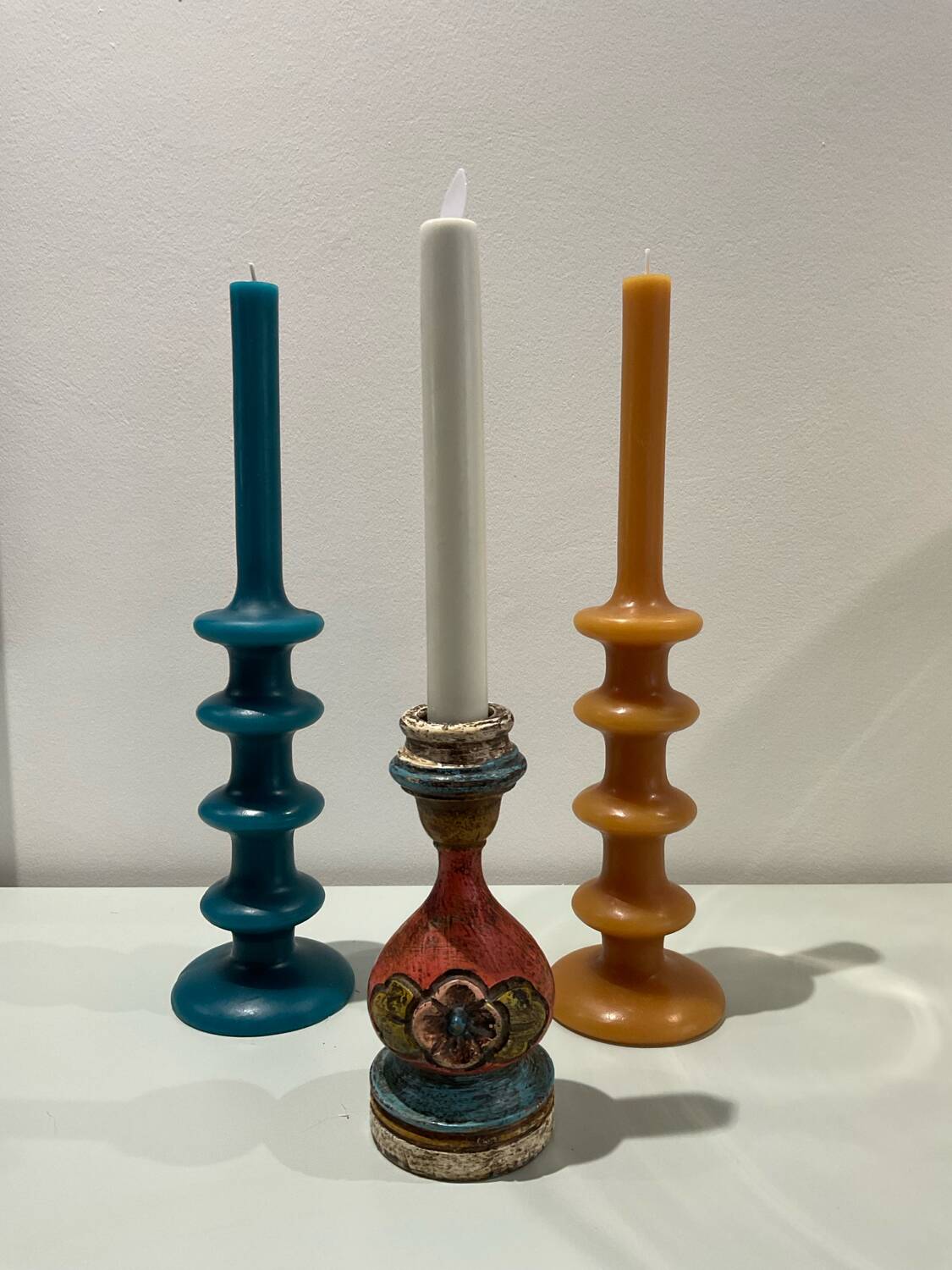 Painted wooden candle holder