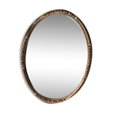 Gilded oval mirror, foliage pattern