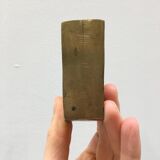 Pair of bronze candle holders by Monique Gerber