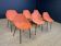 Set of 6 orange Guariche chairs