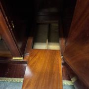 Rare Empire period mahogany secretary with four columns topped with bronze capitals.