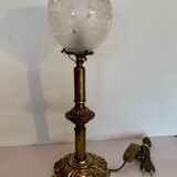 Ancient lamp on foot