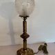 Ancient lamp on foot