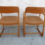 Pair of Baumann armchairs model sled