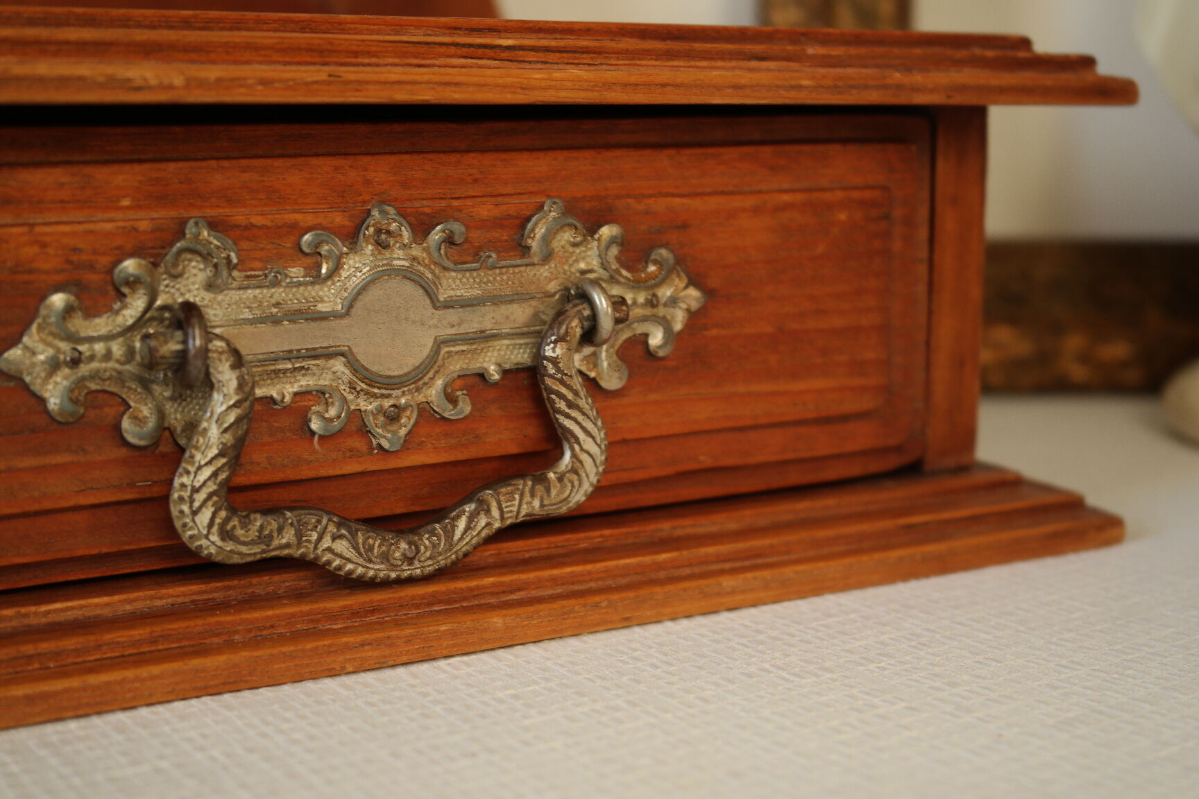 Antique wooden table mirror in Art Deco style.