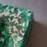 Design bookends in fractal resin with watchmaking inclusions.