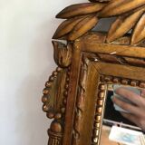 Gilded wooden pediment mirror