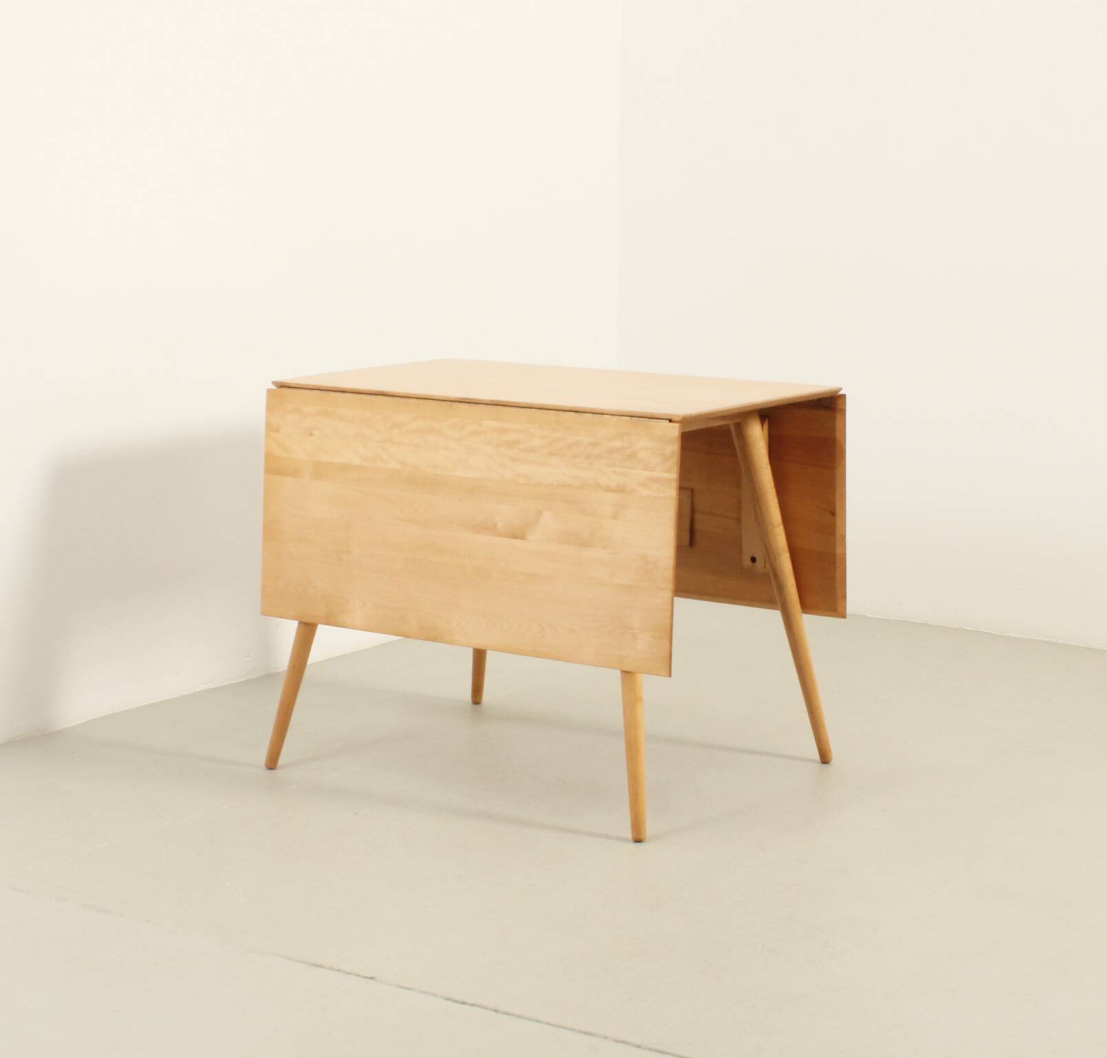 Dining table with drop leaves by Planner Group by Paul McCobb, 1950s