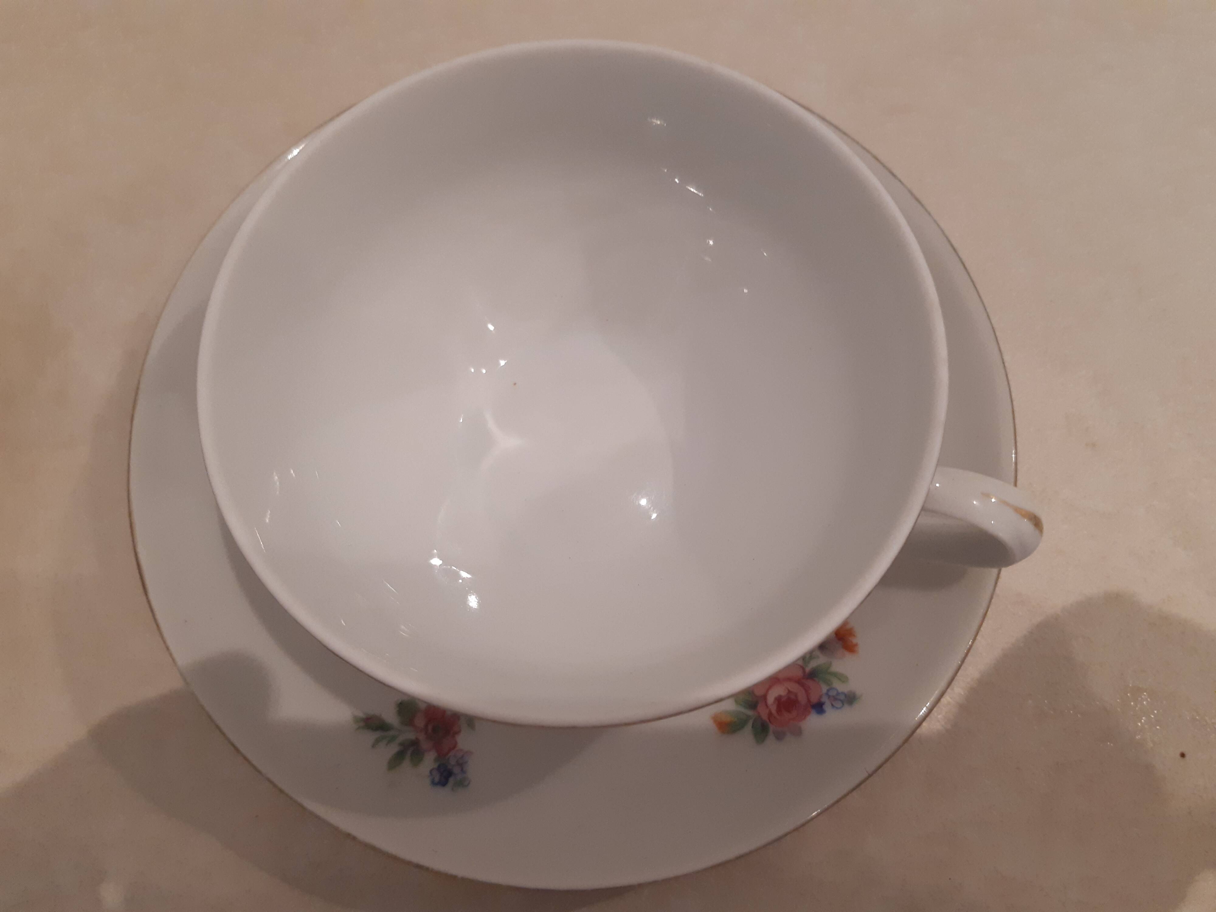 Breakfast set in white porcelain with floral decoration, 1930s.