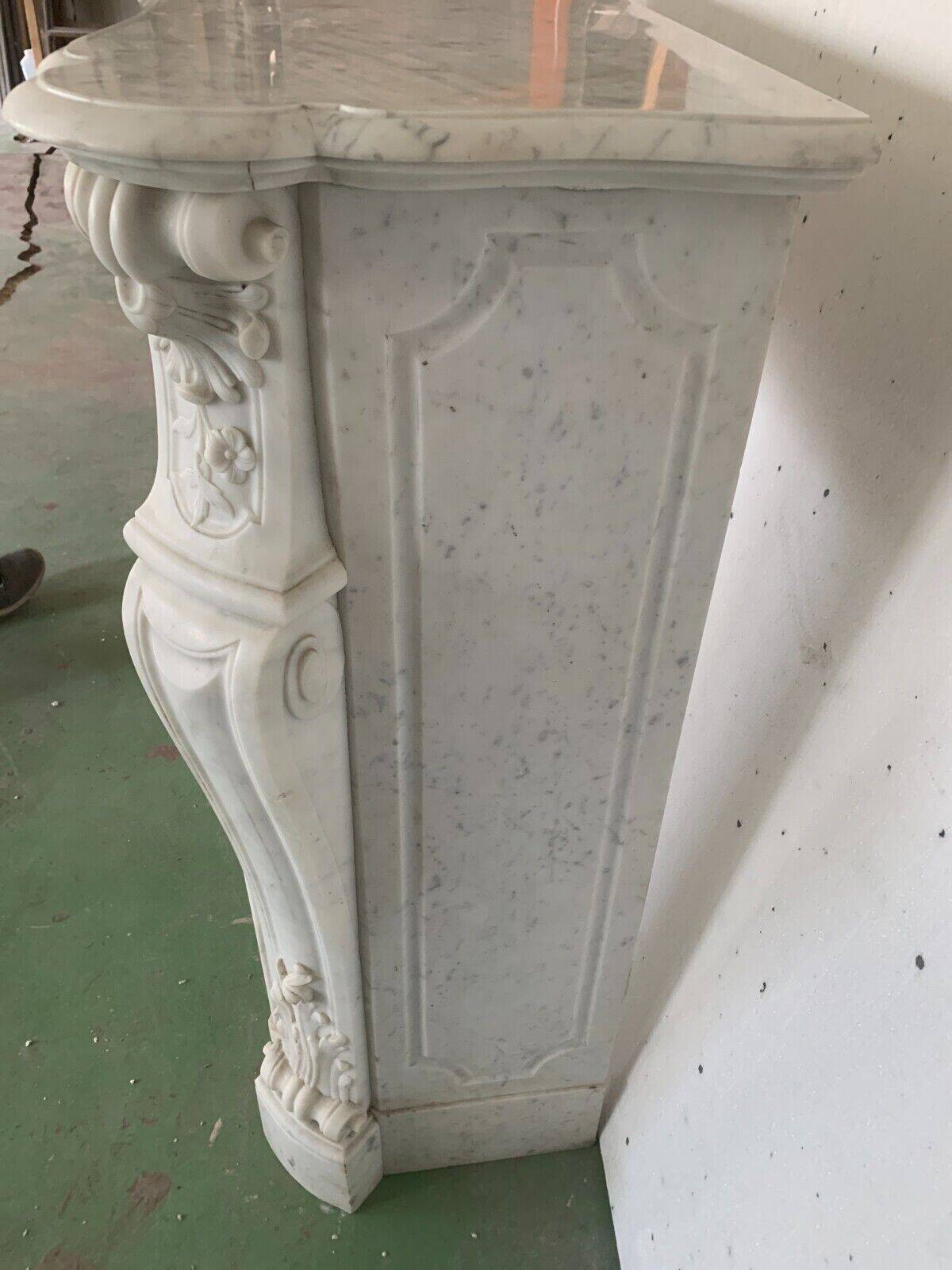 Louis XV style fireplace in white Carrara marble 19th century