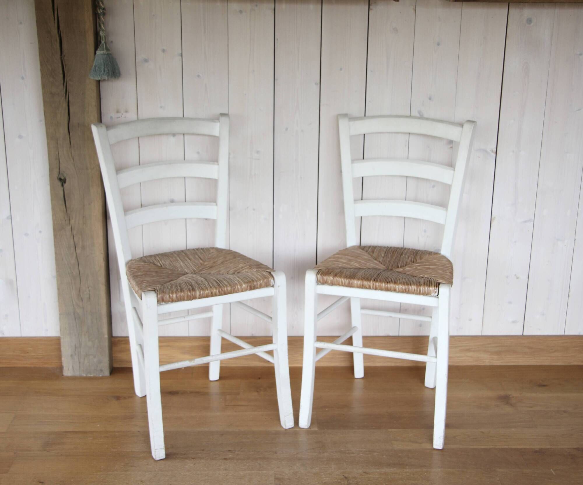Pair of white rush chairs