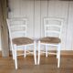 Pair of white rush chairs