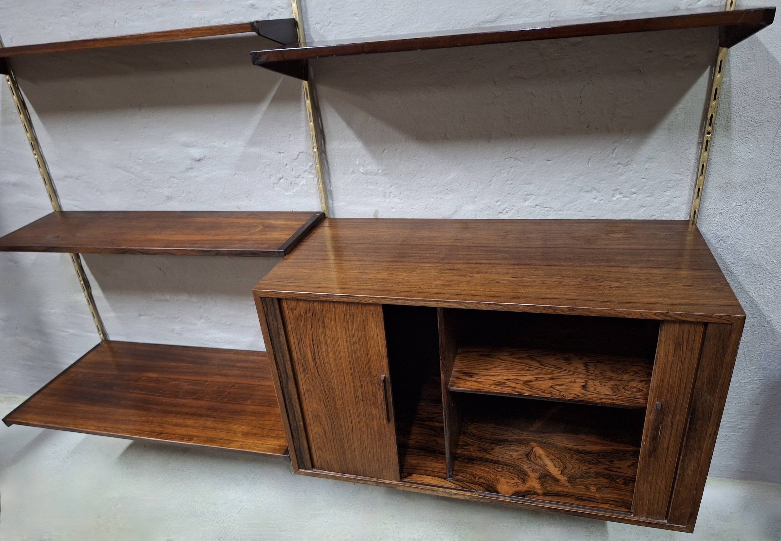 Modular shelving system in rosewood by Kai Kristiansen, Denmark, 1960s.