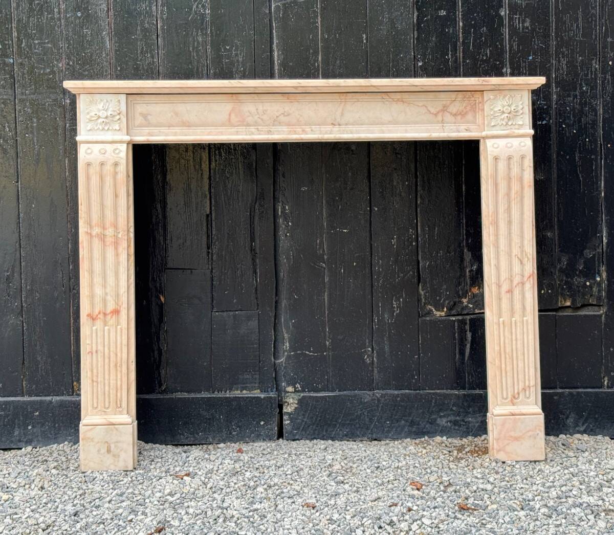 Louis XVI style fireplace in pink marble, circa 1920