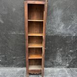 Old narrow wooden showcase.