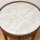Bouillotte table in Louis XVI style with marquetry, marble, and brass.