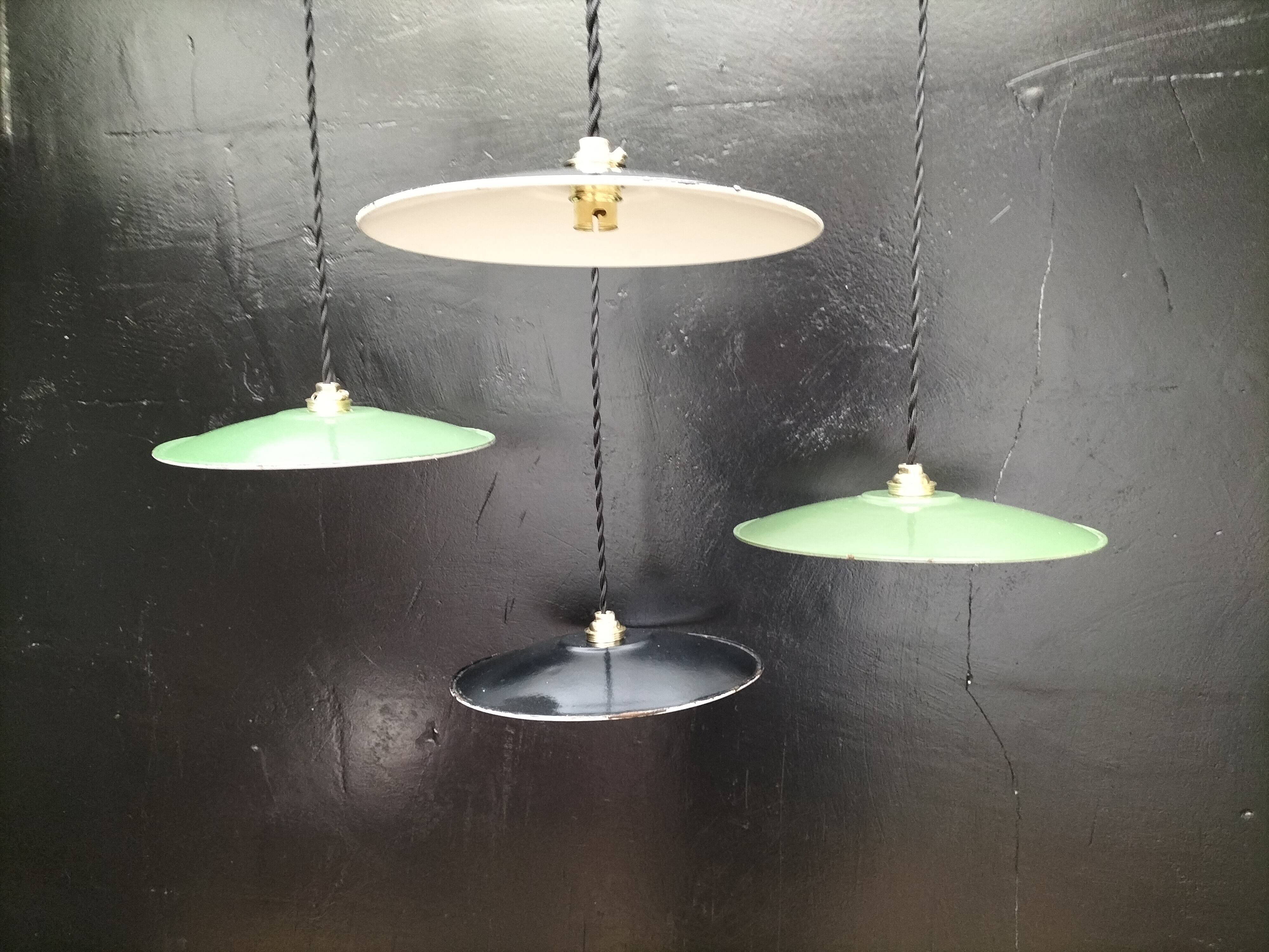 4 enameled sheet metal pendants