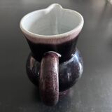 Antique tilted pitcher