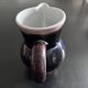 Antique tilted pitcher