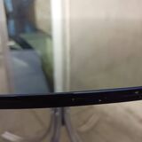 Chromed metal and smoked glass table