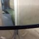 Chromed metal and smoked glass table