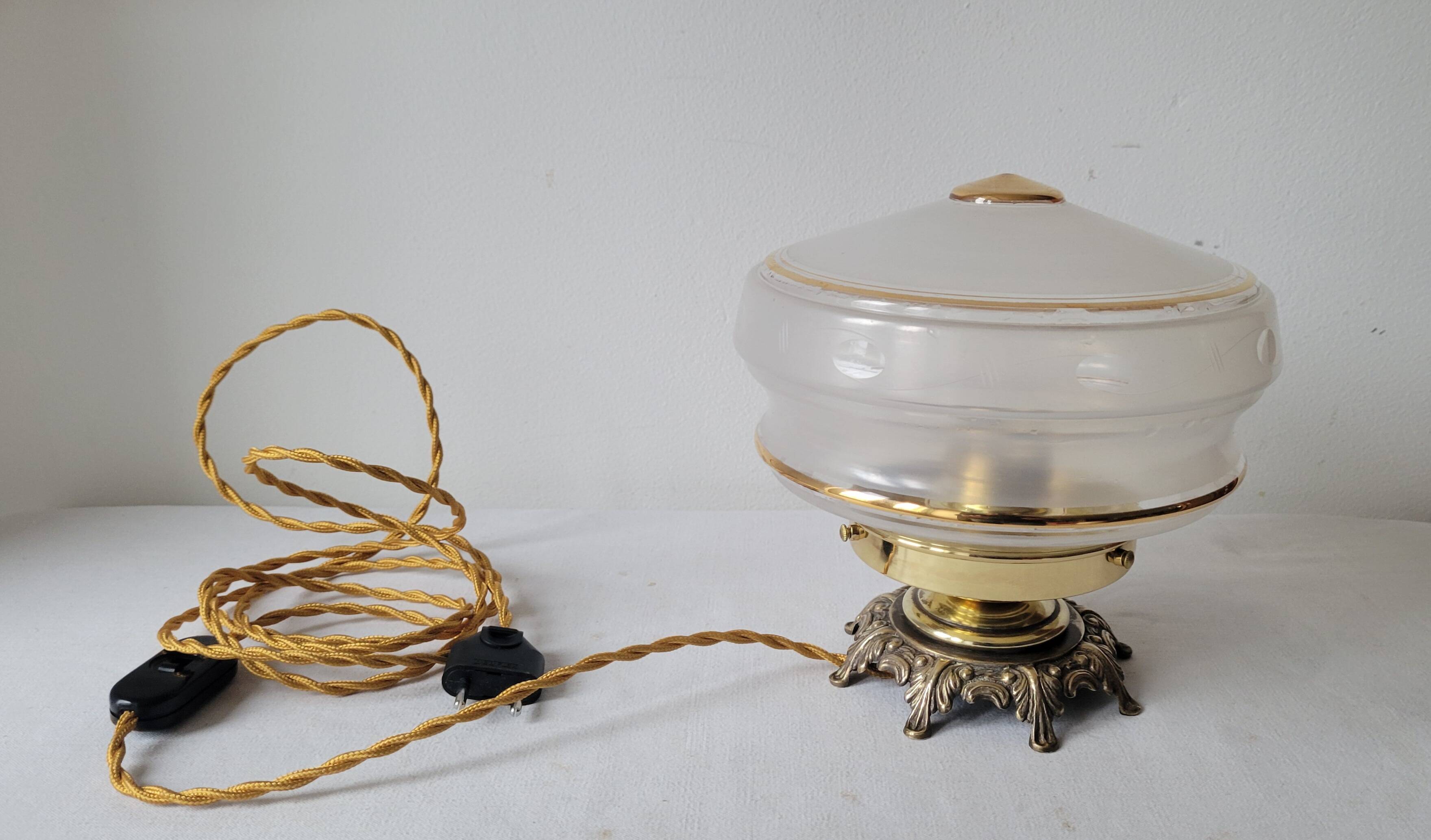 Brass and frosted glass lamp