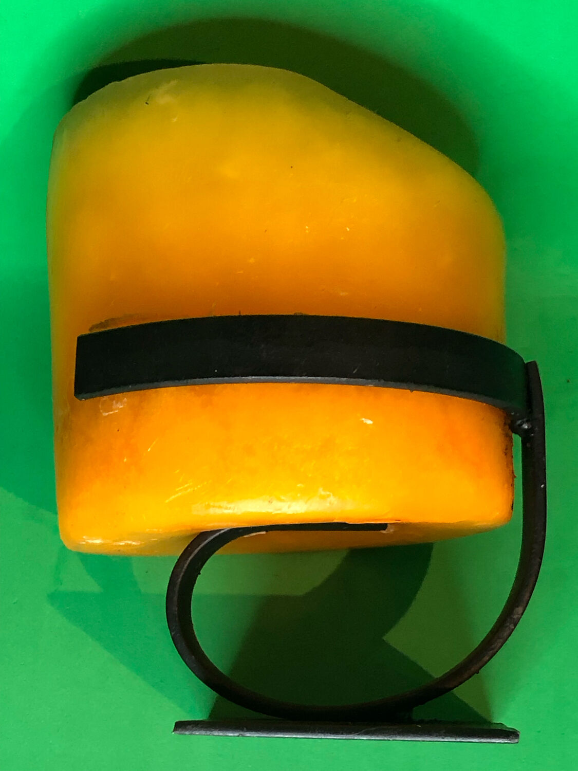 Flat iron candle holder