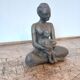 Terracotta statue of a woman with child, signed