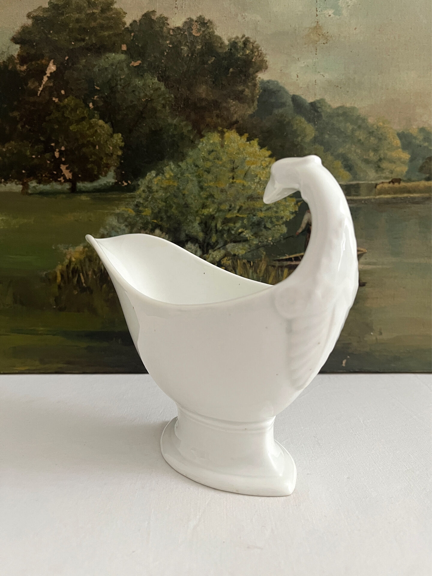 Empire sauce boat with eagle head in antique porcelain