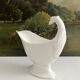 Empire sauce boat with eagle head in antique porcelain
