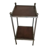 Pedestal table in leather and metal