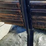 Public bench in wooden slat and cast iron