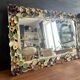 Italian wall mirror in polychrome floral metal, 1950s